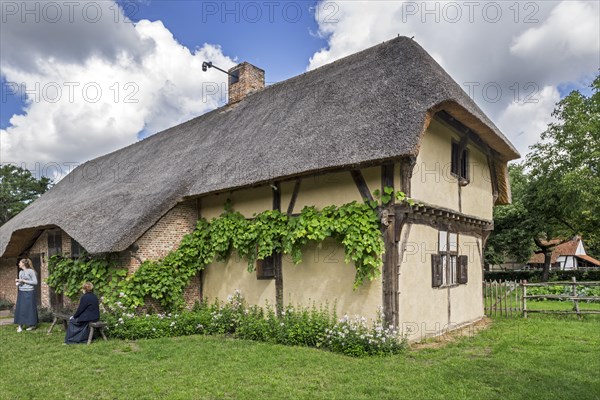 Tourists visiting the 16th century Bruegel farm at the open air museum Bokrijk