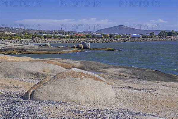 Large granite boulders on beach along the Atlantic Ocean at Langebaan