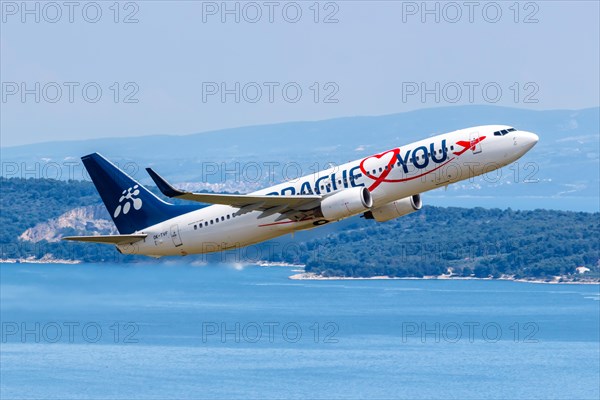 A Boeing 737-800 Travel Service aircraft with the registration OK-TVF and the Prague Loves You special livery at Split Airport