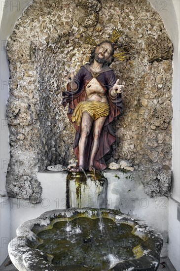 Grotto with figure of Jesus and fountain