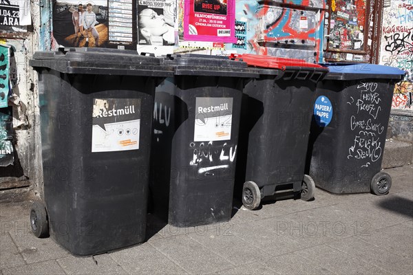 Rubbish bins standing on the street