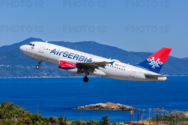 An Air Serbia Airbus A319 aircraft with the registration YU-APF at Skiathos Airport