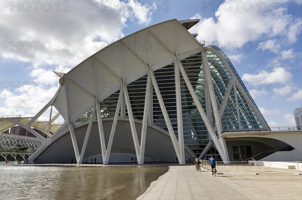 Cyclist in front of the science museum Museu de les Ciencies Princep Felip