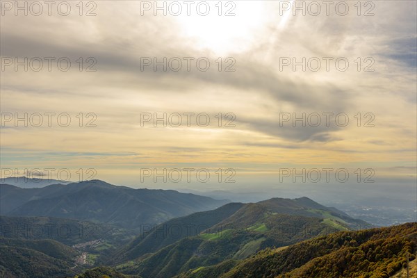 Aerial View over Beautiful Mountainscape with Clouds in a Sunny Day in Valley Muggio in Ticino