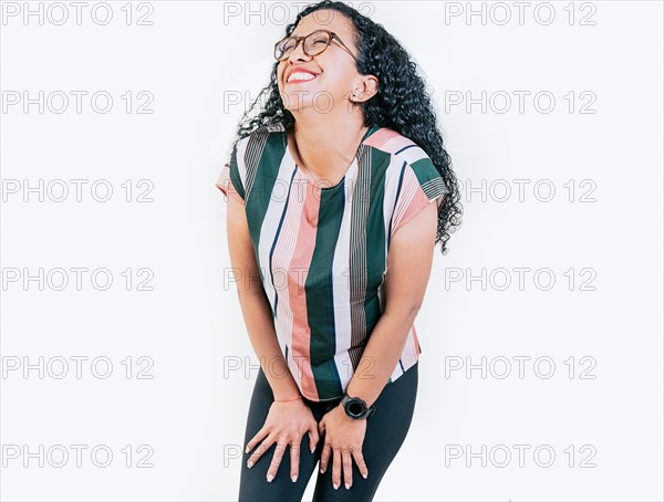 Young woman in glasses laughing out loud isolated. Funny young afro woman laughing on isolated background