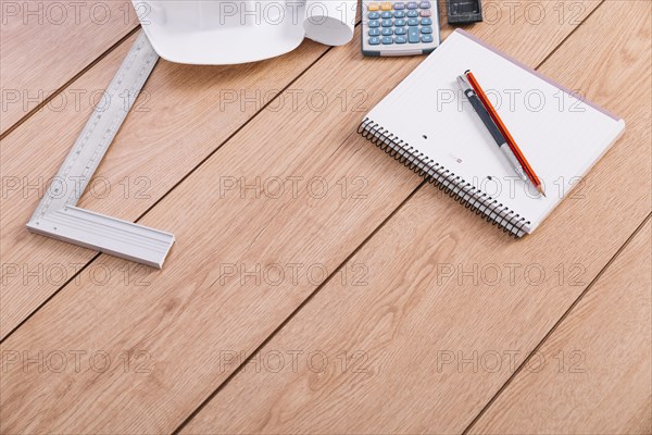 Notebook near measuring tools