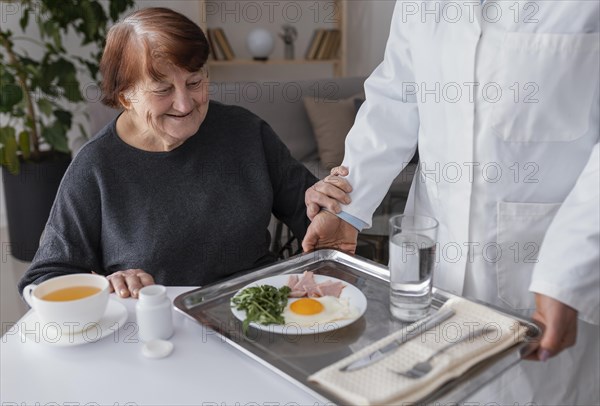 Close up woman having breakfast