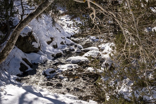 Winter landscape with snow in the snowy mountains of the Pyrenees of Andorra