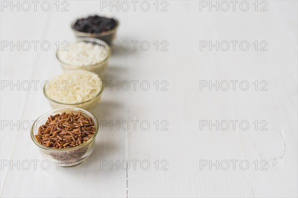 Black white brown puff rice bowls arranged row with space text