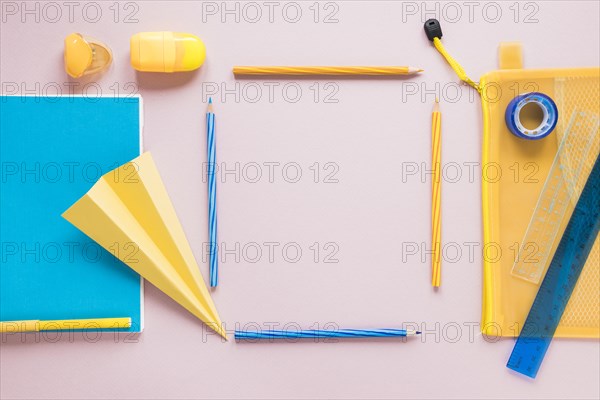 Creative workspace with pencils laid out square shape