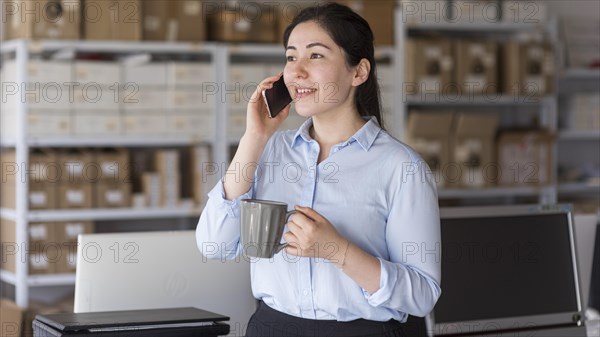 Business woman discussing phone