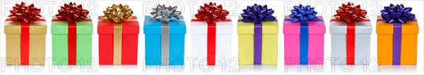 Many colourful Christmas gifts Christmas presents birthday panorama gift isolated in front of a white background in Stuttgart