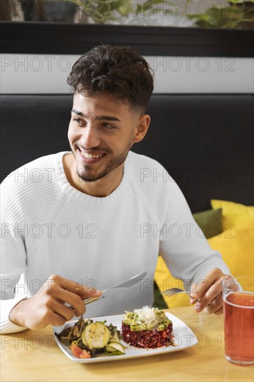 Medium shot smiley man with food