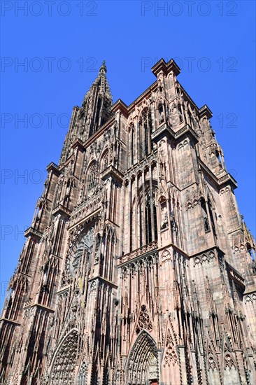 Tower of famous Strasbourg Cathedral in France in romanesque and gothic architecture style