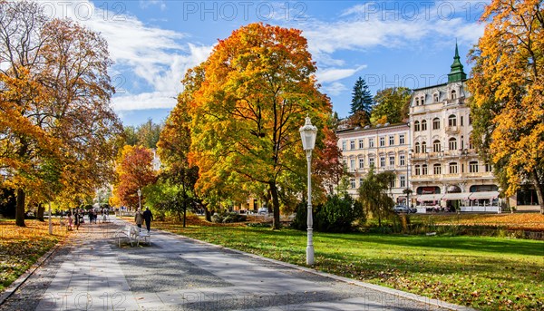 Promenade in autumn spa park