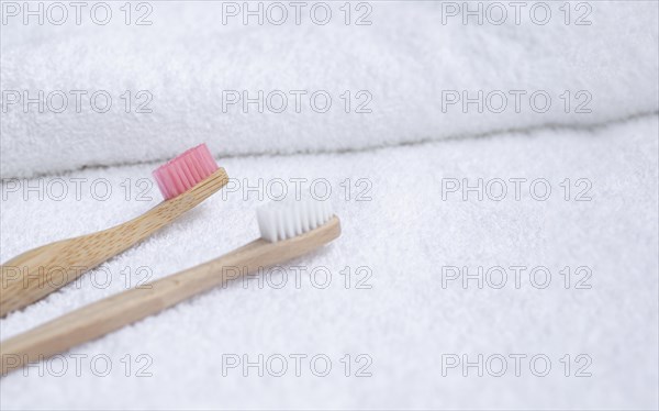 High angle toothbrushes white towel