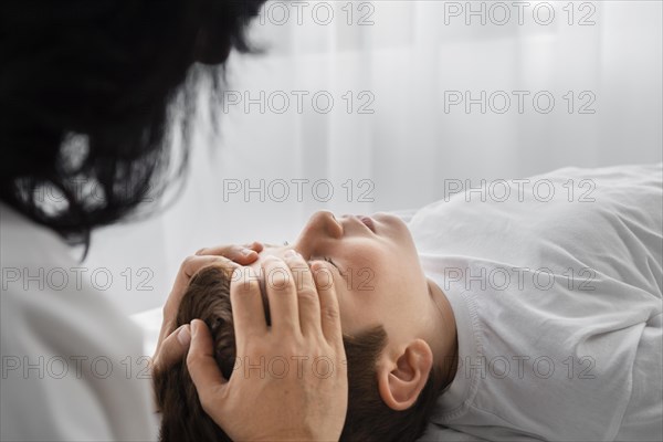 Osteopathist treating child hospital