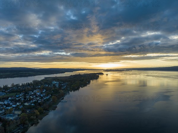 Aerial view of western Lake Constance at sunrise with the Mettnau peninsula and the island of Reichenau on the horizon