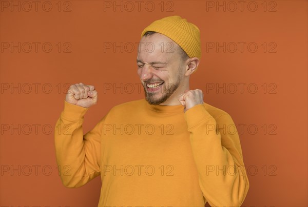 Happy young man laughing 5