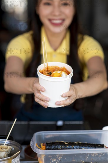 Close up blurry woman with food 2