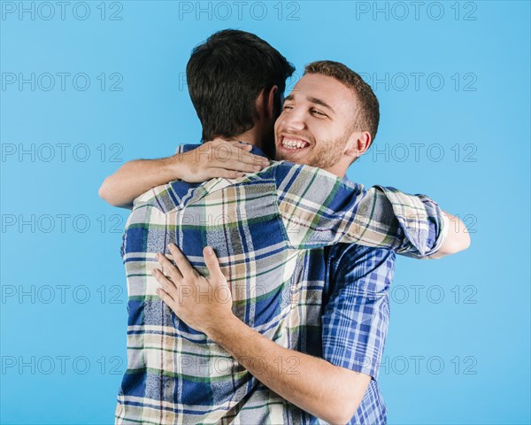 Embracing men plaid shirts