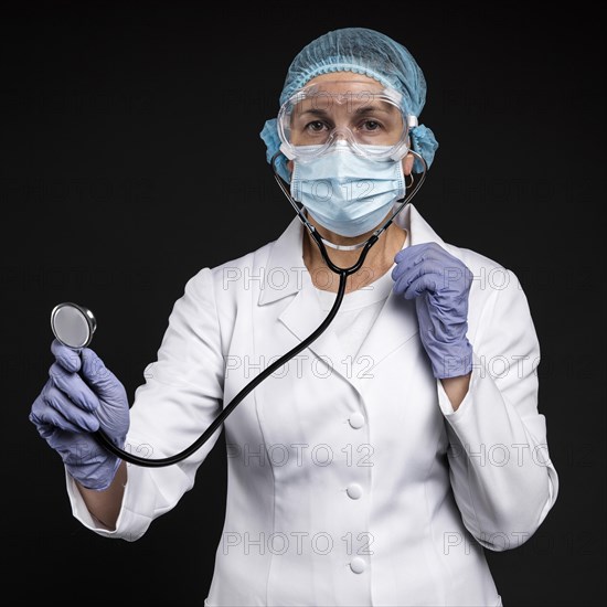 Female doctor wearing pandemic medical equipment