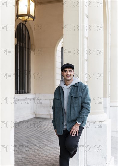 Medium shot smiley man posing outdoors