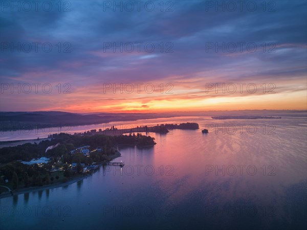 Aerial view of western Lake Constance in front of sunrise with the Mettnau peninsula