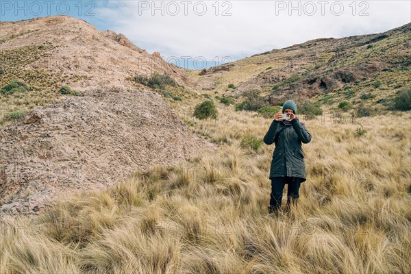 Woman akes photos of the photographer