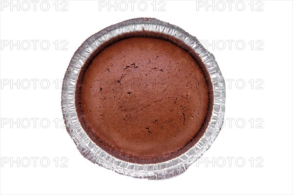 Top view of chocolate brownie in a baking foil dish