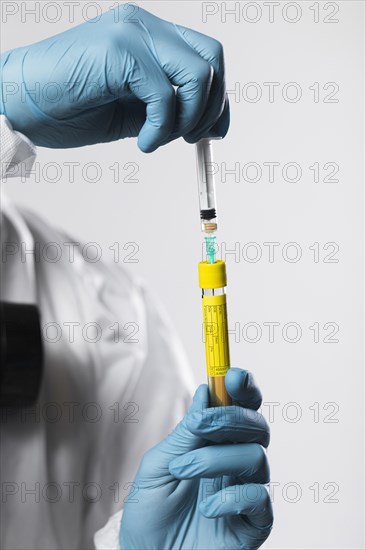 Close up person preparing medical treatment