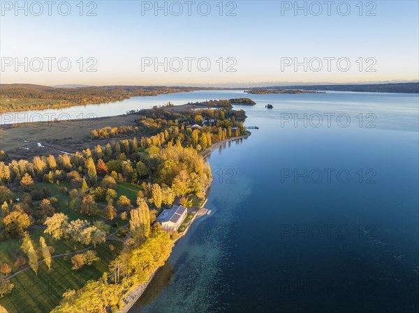 Aerial view of the Mettnau peninsula in western Lake Constance with autumn vegetation