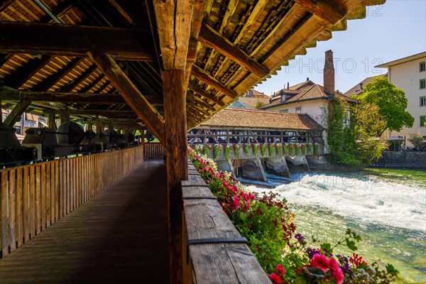 River Aare in City of Thun and Untere Schleuse Bridge in a Sunny Summer Day