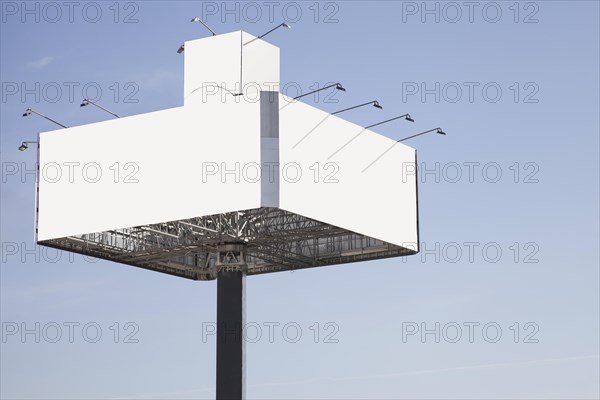 Blank billboard ready new advertisement against blue sky