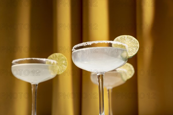 Close up margarita cocktails with salty rim