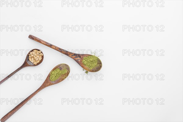 Close up spoons with matcha tea powder