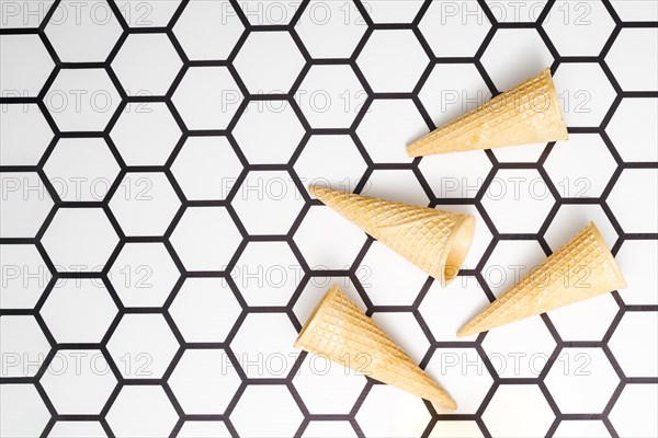 Empty waffle cones hexagon background