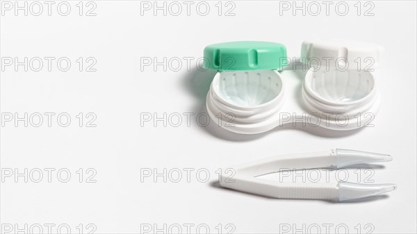 High angle contact lenses case with copy space tweezers