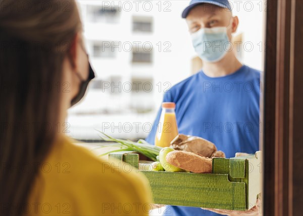 Close up man delivering food