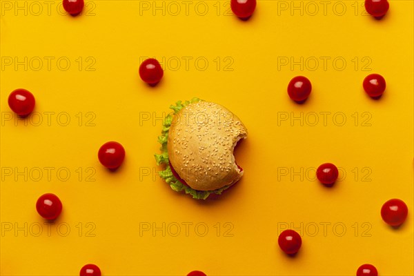 Flat lay burger with cherry tomatoes