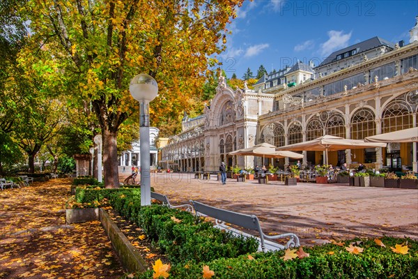 Spa promenade with spa colonnade in the autumnal spa park