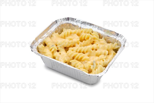 Classic mac and cheese in foil container isolated on white background