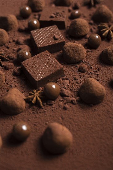 Close up chocolate waffles truffles cocoa powder