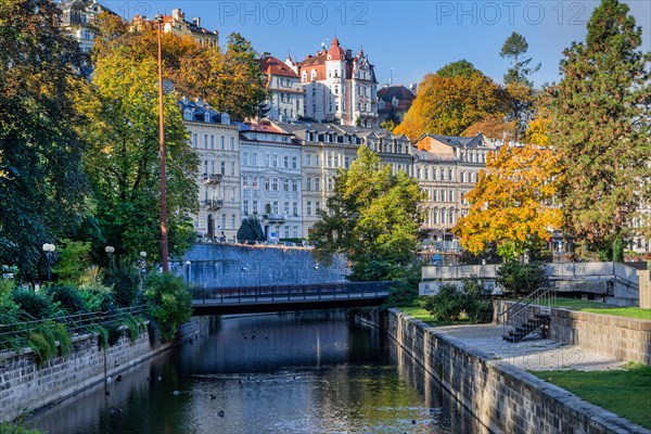 Typical facades on the banks of the Tepla in autumn