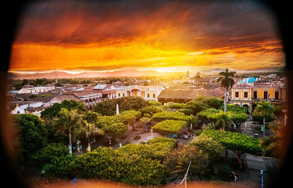 View of the central park of Granada at sunset. Beautiful view of central park of Granada from the viewpoint. Tourist places in Granada