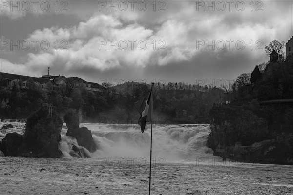 Rhine Falls and Swiss Flag at Neuhausen in Schaffhausen