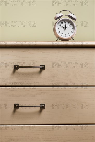 Alarm clock wooden closed drawer