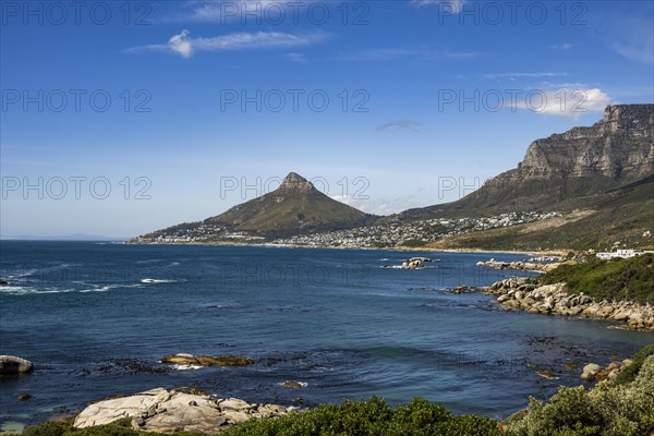 Atlantic Ocean with Lion's head and Table Mountain from Llandudno beachCape Town