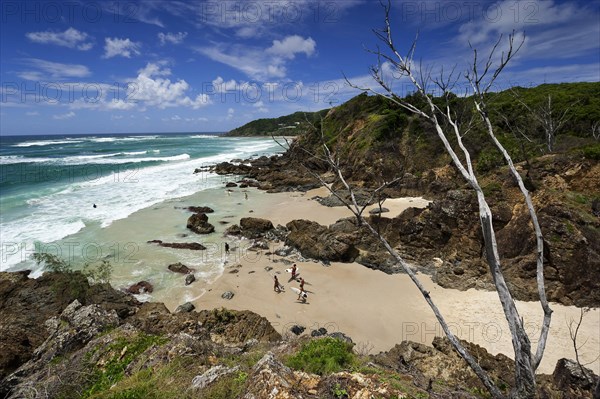 Surfer on the beach of Byron bay