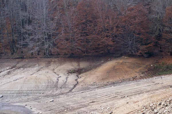 Desolate landscape of drought in the Santa Fe reservoir in the Montseny Biosphere Reserve in the province of Barcelona in Spain